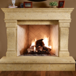 A tan fireplace burning firewood
