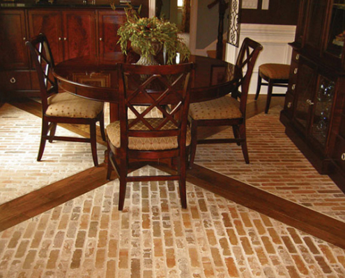 A brick and wood dining room floor
